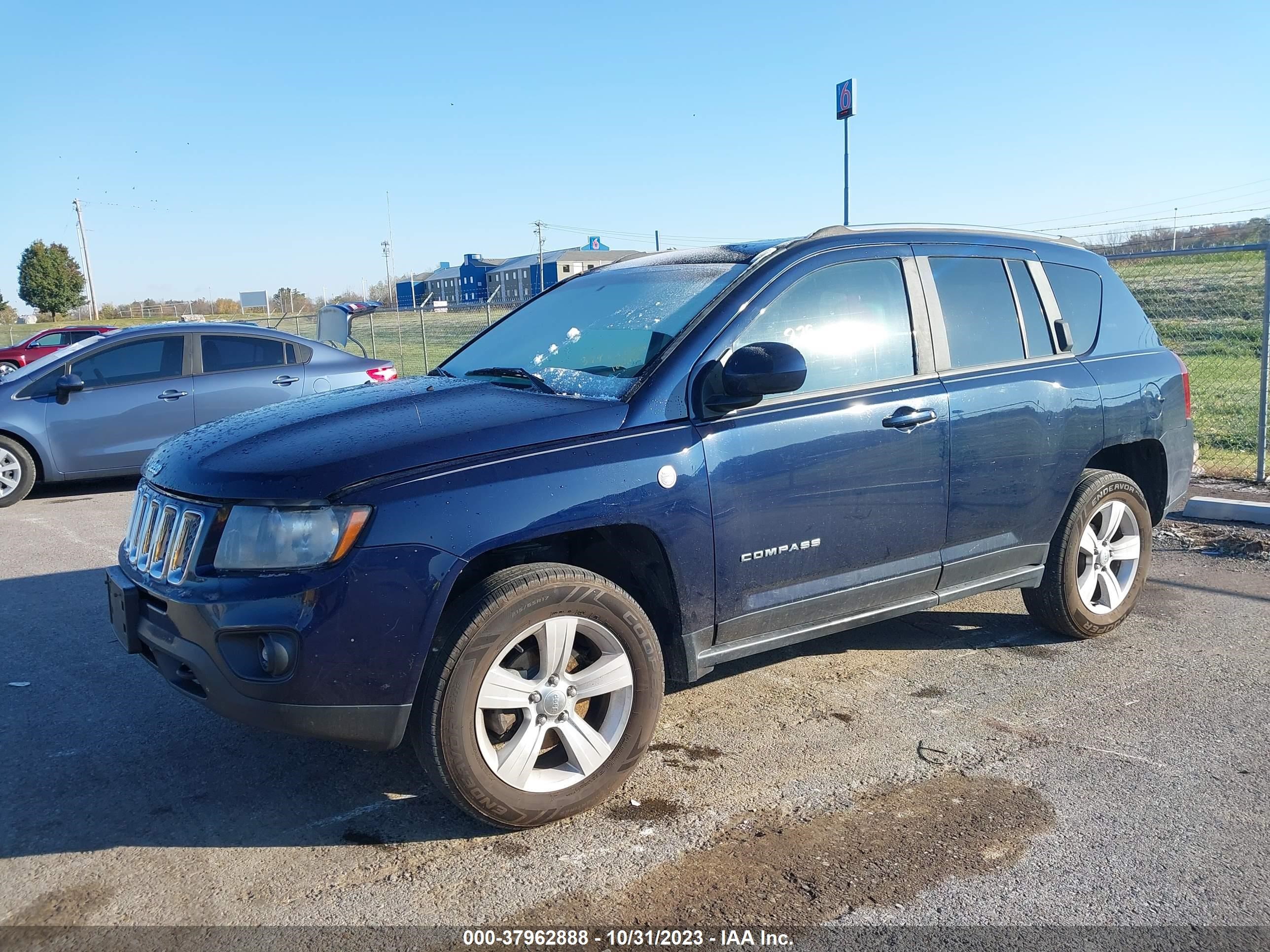 2014 Jeep Compass Latitude vin: 1C4NJDEB7ED599872