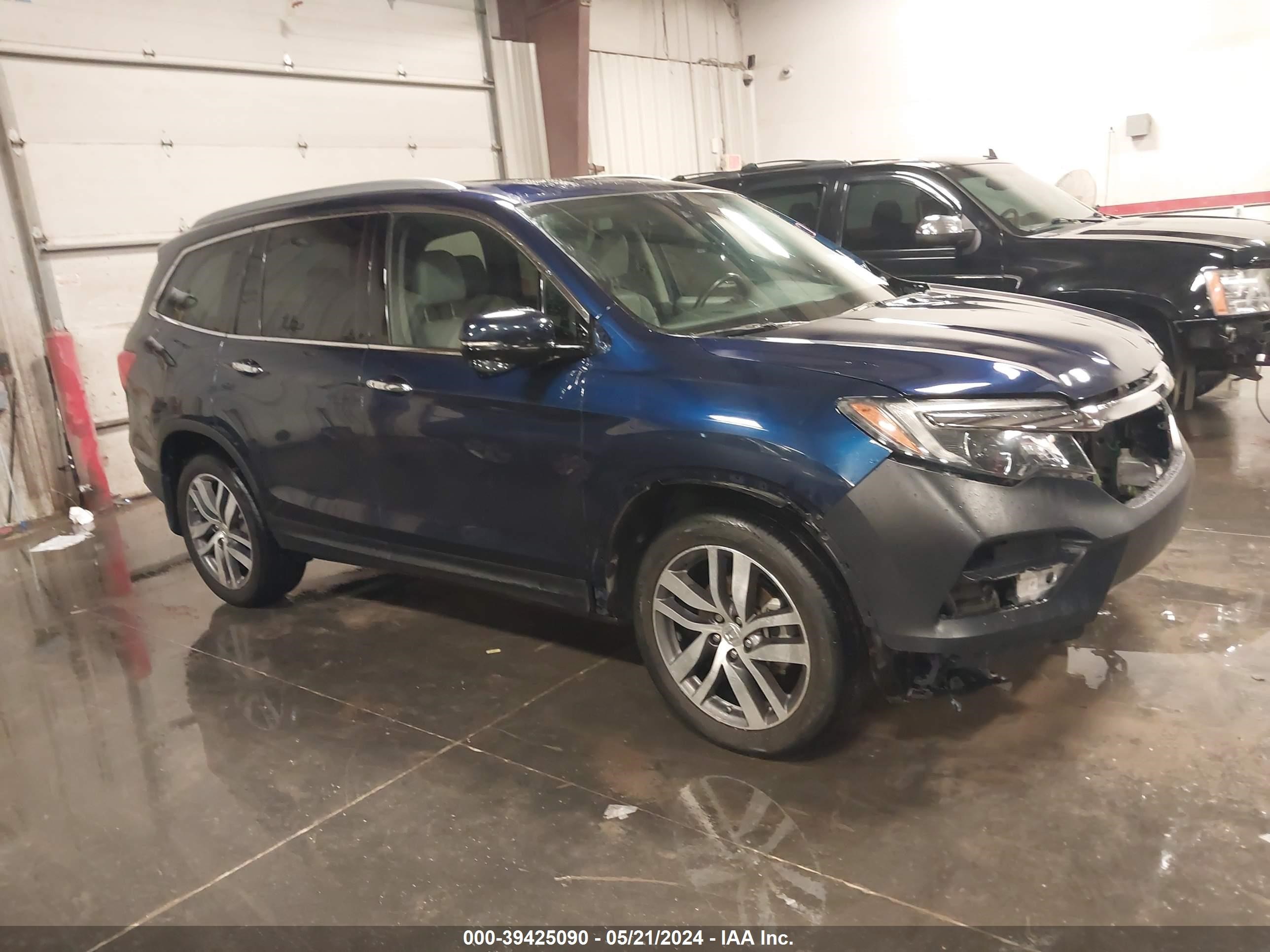 2016 Honda Pilot Touring vin: 5FNYF6H90GB099275