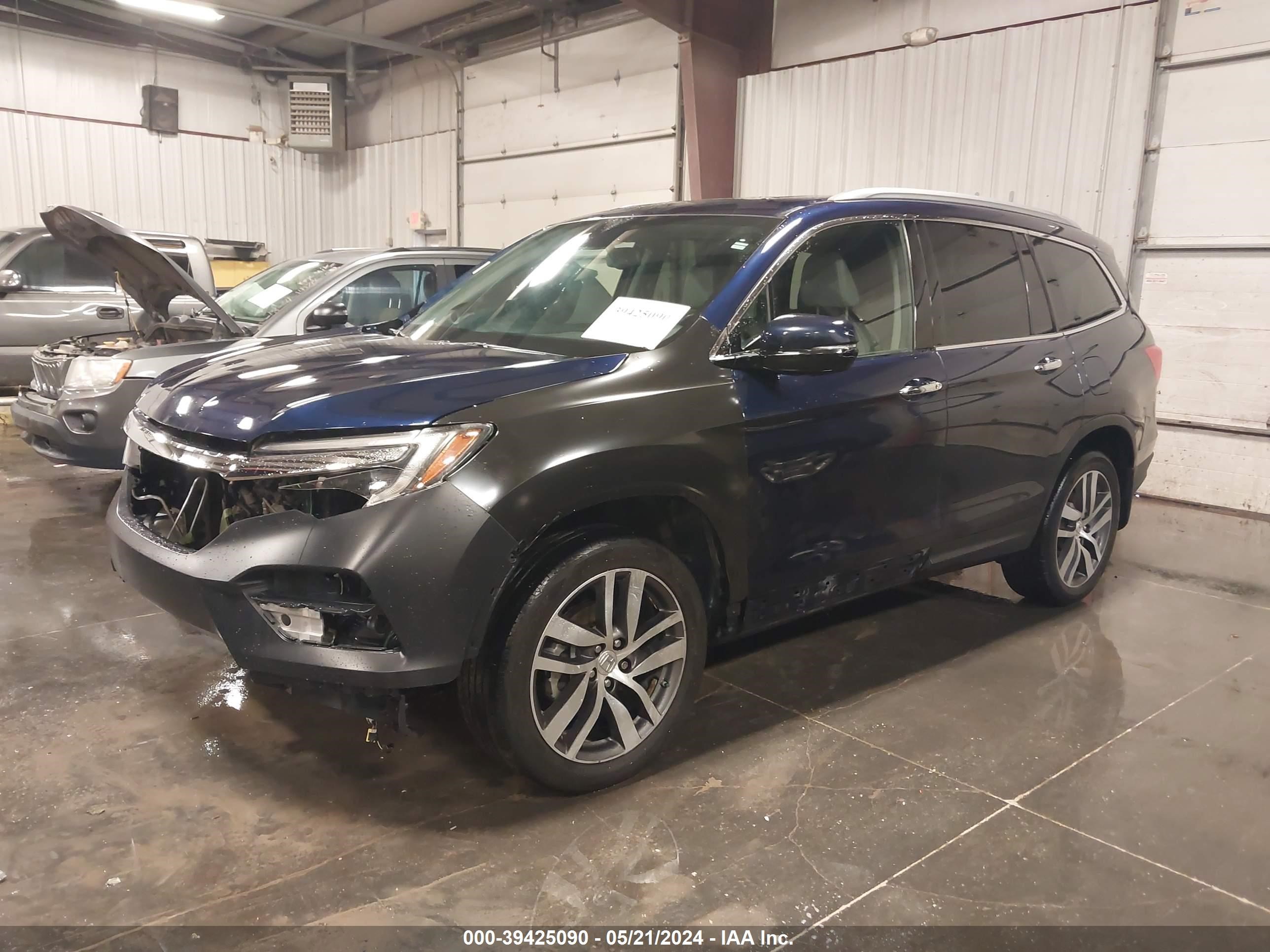 2016 Honda Pilot Touring vin: 5FNYF6H90GB099275