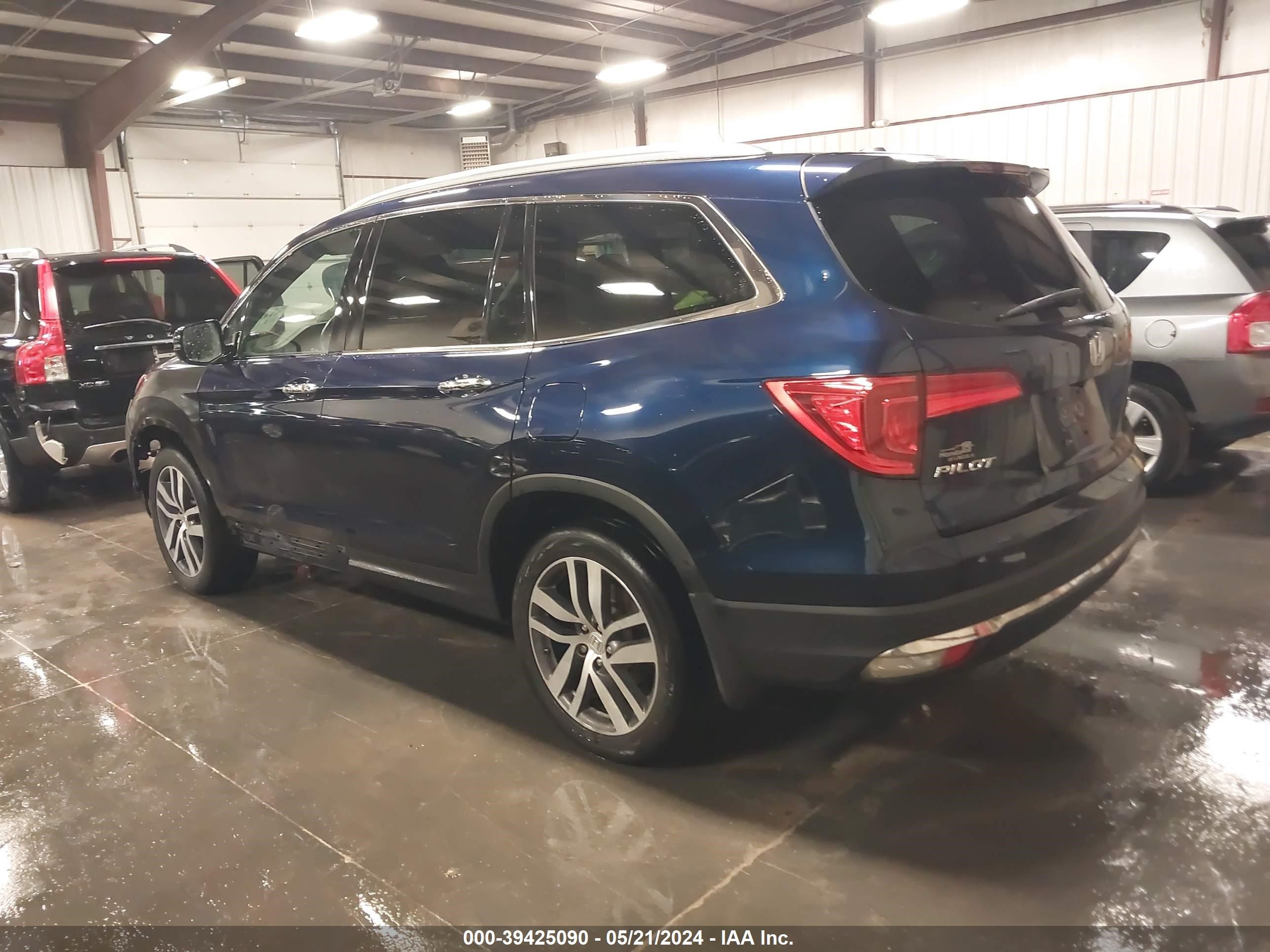 2016 Honda Pilot Touring vin: 5FNYF6H90GB099275