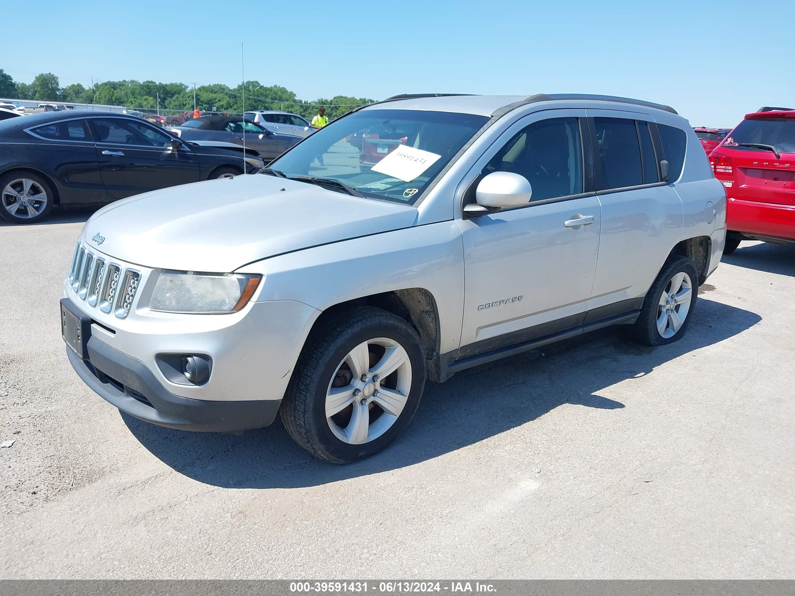 2014 Jeep Compass Latitude vin: 1C4NJCEB9ED518087