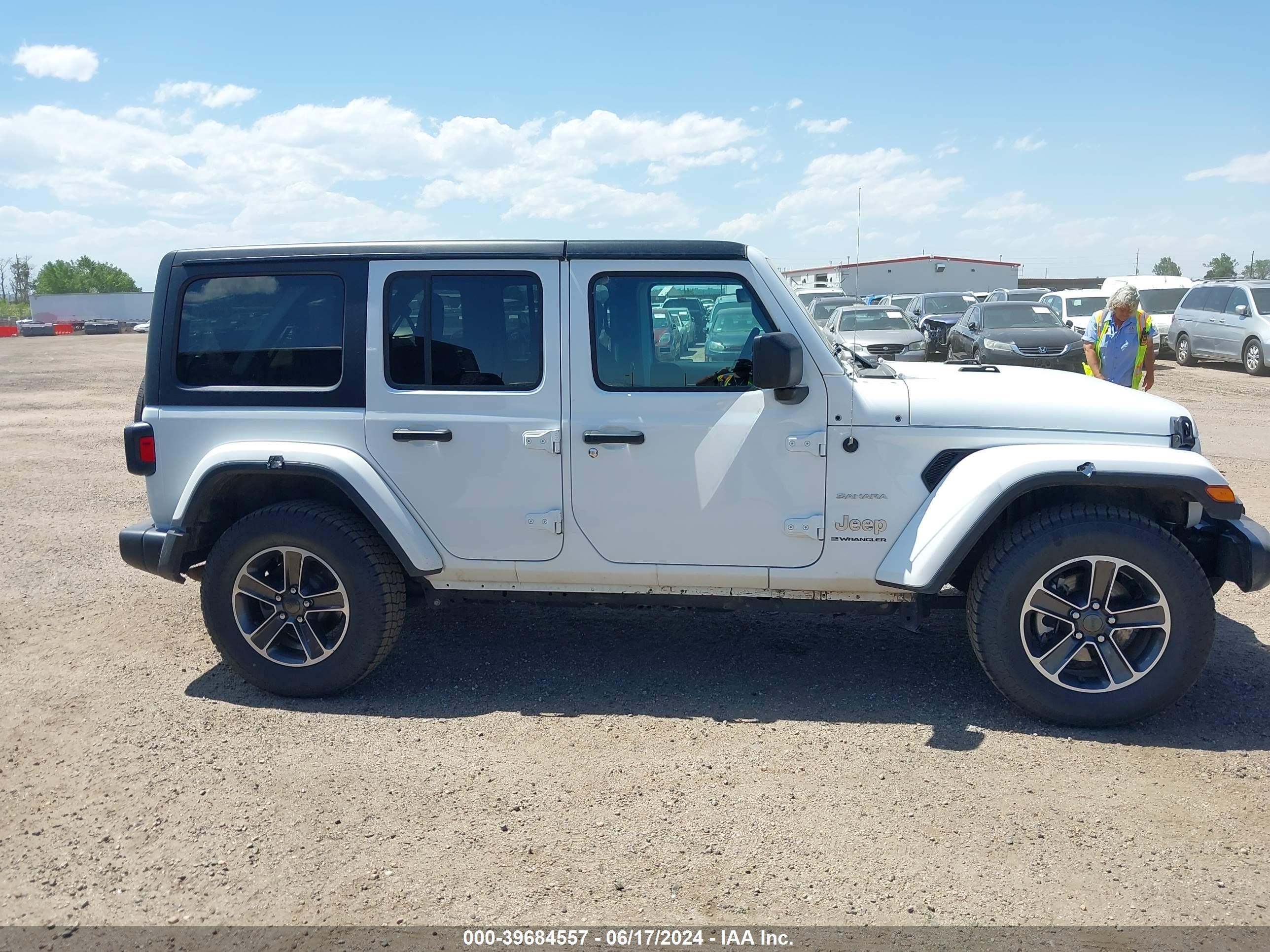 2023 Jeep Wrangler 4-Door Sahara 4X4 vin: 1C4HJXEN1PW614530