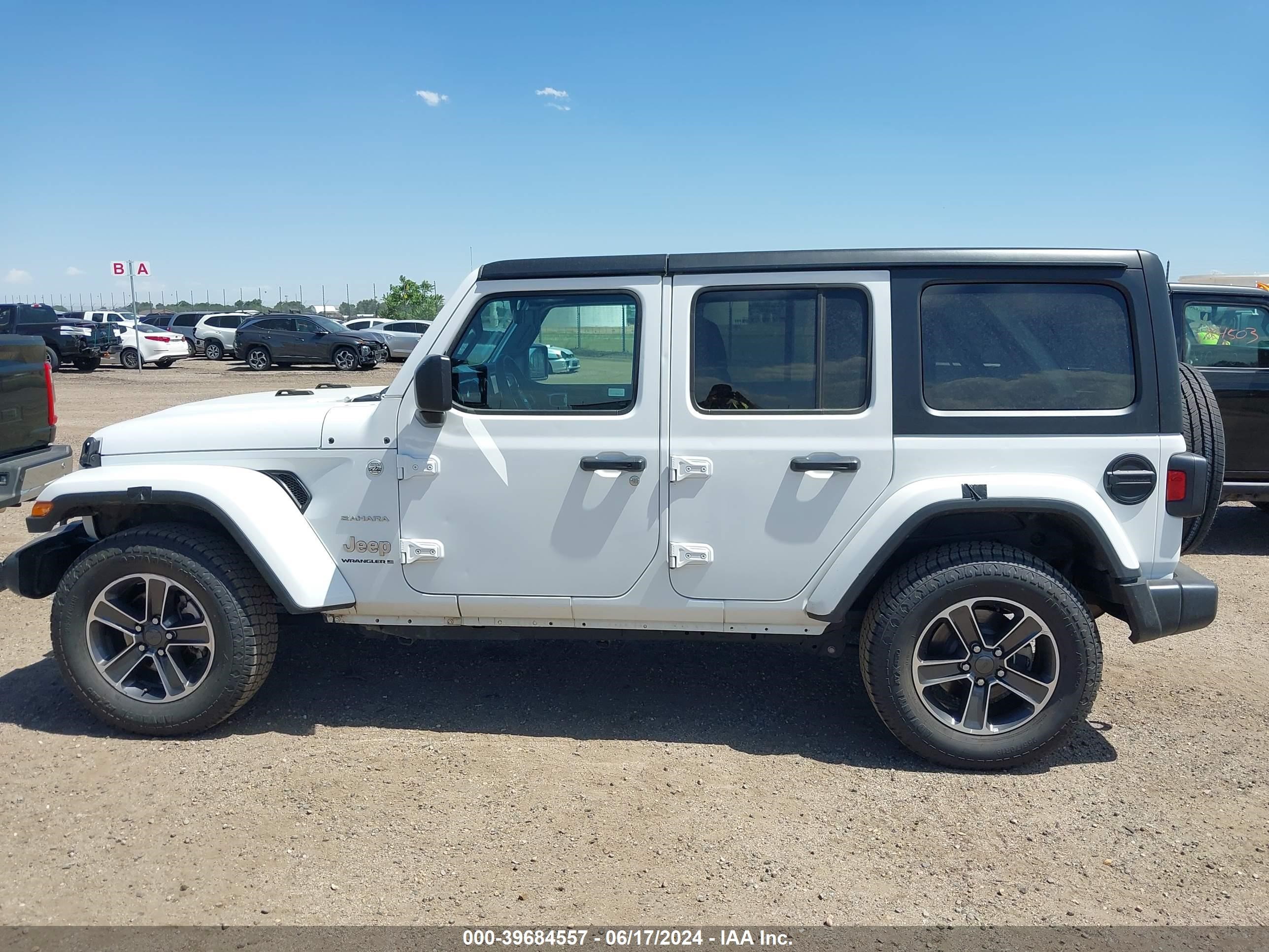 2023 Jeep Wrangler 4-Door Sahara 4X4 vin: 1C4HJXEN1PW614530