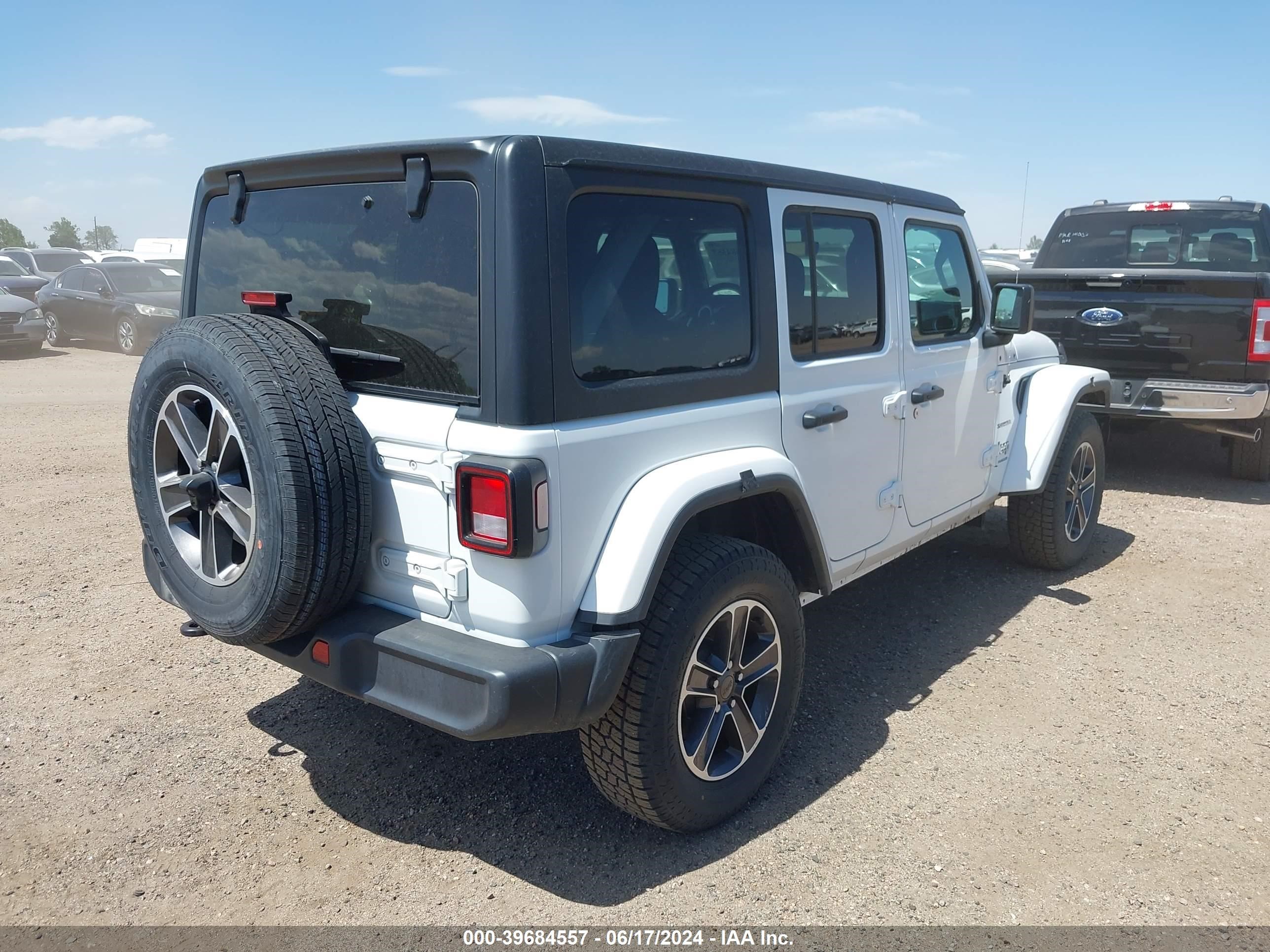 2023 Jeep Wrangler 4-Door Sahara 4X4 vin: 1C4HJXEN1PW614530