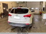 Hyundai Santa Fe Sport 5XYZUDLB8GG319568 снимка