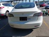 Tesla Model 3 5YJ3E1EAXPF492179 снимка