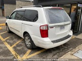 Hyundai Entourage KNDMT4C32A6057384 снимка
