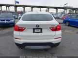BMW X4 5UXXW3C35H0****** photo