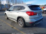 BMW X1 WBXHT3C37G5F63826 снимка