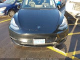 Tesla Model Y 5YJYGDEE7LF051947 photo