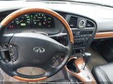 Infiniti Qx4 JNRDR09Y82W254717 снимка