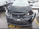 Toyota Corolla Hybrid Le JTDBCMFE0RJ022100 photo