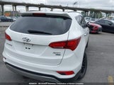 Hyundai Santa Fe Sport 5XYZUDLB9HG431944 photo