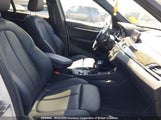 BMW X1 WBXHT3C37H5F74052 снимка