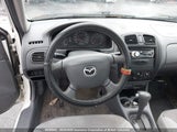 Mazda Protege Dx/Lx JM1BJ2225Y0257974 снимка
