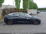Tesla Model 3 5YJ3E1EC6PF480919 photo
