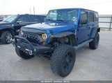 Jeep Wrangler Unlimited Sahara 1J4HA5H16AL156418 снимка