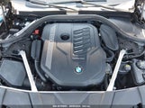 BMW 740I XDRIVE WBA7T4C03LGF97293 снимка