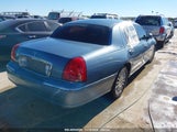 LINCOLN TOWN CAR ULTIMATE 1LNHM83W84Y****** снимка