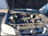 MAZDA TRIBUTE S 4F2YZ04145K****** photo