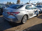 TOYOTA CAMRY HYBRID XLE 4T1B21HK8KU****** photo