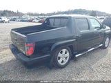 HONDA RIDGELINE RTL 5FPYK1F51EB****** photo