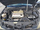 TOYOTA CAMRY SOLARA SLE 4T1FA38P78U****** снимка