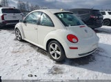 VOLKSWAGEN NEW BEETLE COUPE BLACK TIE EDITION/TRIPLE WHITE 3VWFW31C18M****** photo