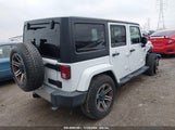 JEEP WRANGLER UNLIMITED SAHARA 1C4HJWEG1FL****** photo
