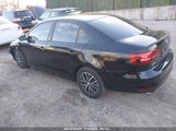 VOLKSWAGEN JETTA 1.4T SE/1.4T WOLFSBURG EDITION 3VWDB7AJXJM210077 снимка