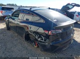 TESLA MODEL Y PERFORMANCE DUAL MOTOR ALL-WHEEL DRIVE 7SAYGDEF2NF562903 fotografie