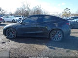 TESLA MODEL Y PERFORMANCE DUAL MOTOR ALL-WHEEL DRIVE 7SAYGDEF6PF864276 fotografie