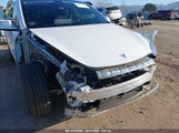 TESLA MODEL Y AWD/LONG RANGE DUAL MOTOR ALL-WHEEL DRIVE 7SAYGDEE1PA128818 photo
