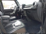 JEEP WRANGLER UNLIMITED SAHARA 1C4HJWEG7EL245862 photo