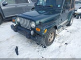 JEEP WRANGLER SAHARA 1J4FA59S74P736918 снимка