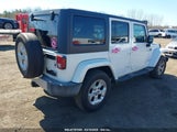 JEEP WRANGLER UNLIMITED SAHARA 1C4HJWEG2EL265839 photo