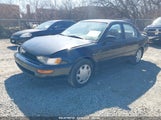 TOYOTA COROLLA DX 1NXBB02E4VZ590713 снимка
