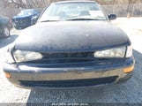TOYOTA COROLLA DX 1NXBB02E4VZ590713 снимка
