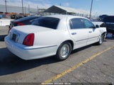 LINCOLN TOWN CAR SIGNATURE 1LNHM82W01Y712594 photo