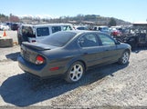 NISSAN MAXIMA GLE/GXE/SE JN1CA31D4YT540588 снимка