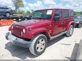 JEEP WRANGLER UNLIMITED SAHARA 1C4BJWEG4CL240928 photo