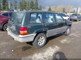 JEEP GRAND CHEROKEE LAREDO 1J4GZ58SXSC676393 photo