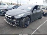 TESLA MODEL Y PERFORMANCE DUAL MOTOR ALL-WHEEL DRIVE 7SAYGDEF9NF573851 photo