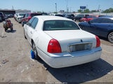 LINCOLN TOWN CAR SIGNATURE 1LNHM81W84Y652859 снимка