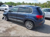 VOLKSWAGEN TIGUAN SE WVGBV3AX4EW544881 photo
