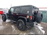 JEEP WRANGLER UNLIMITED SAHARA 1J4BA5H12BL548870 photo