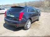 CADILLAC SRX STANDARD 3GYFNAE39FS571065 снимка