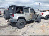 JEEP WRANGLER UNLIMITED SAHARA 1J4HA5H13BL572234 photo