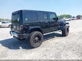 JEEP WRANGLER UNLIMITED SAHARA 1J4BA5H10BL633352 photo