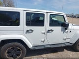 JEEP WRANGLER UNLIMITED SAHARA 1C4HJWEG3CL254944 photo